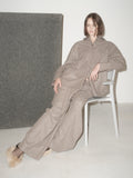 EASY DOES IT wide-leg wool trousers in warm beige, styled as a relaxed suit with THE STATEMENT SHIRT