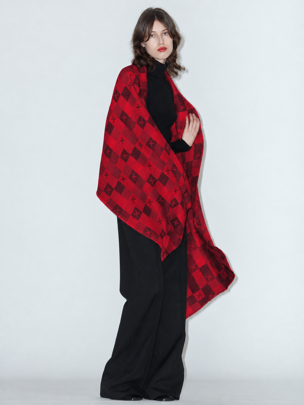 TIC-TAC-TOE wool and cotton scarf in Red worn by a model, side view