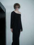 DISRUPTIVE BABE dress in Black Fluid by Xenia Joost, off-shoulder view