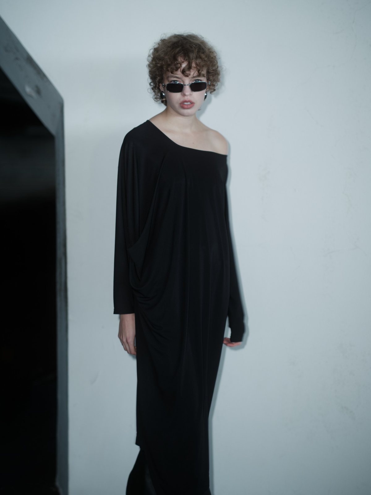 DISRUPTIVE BABE dress in Black Fluid by Xenia Joost, off-shoulder view