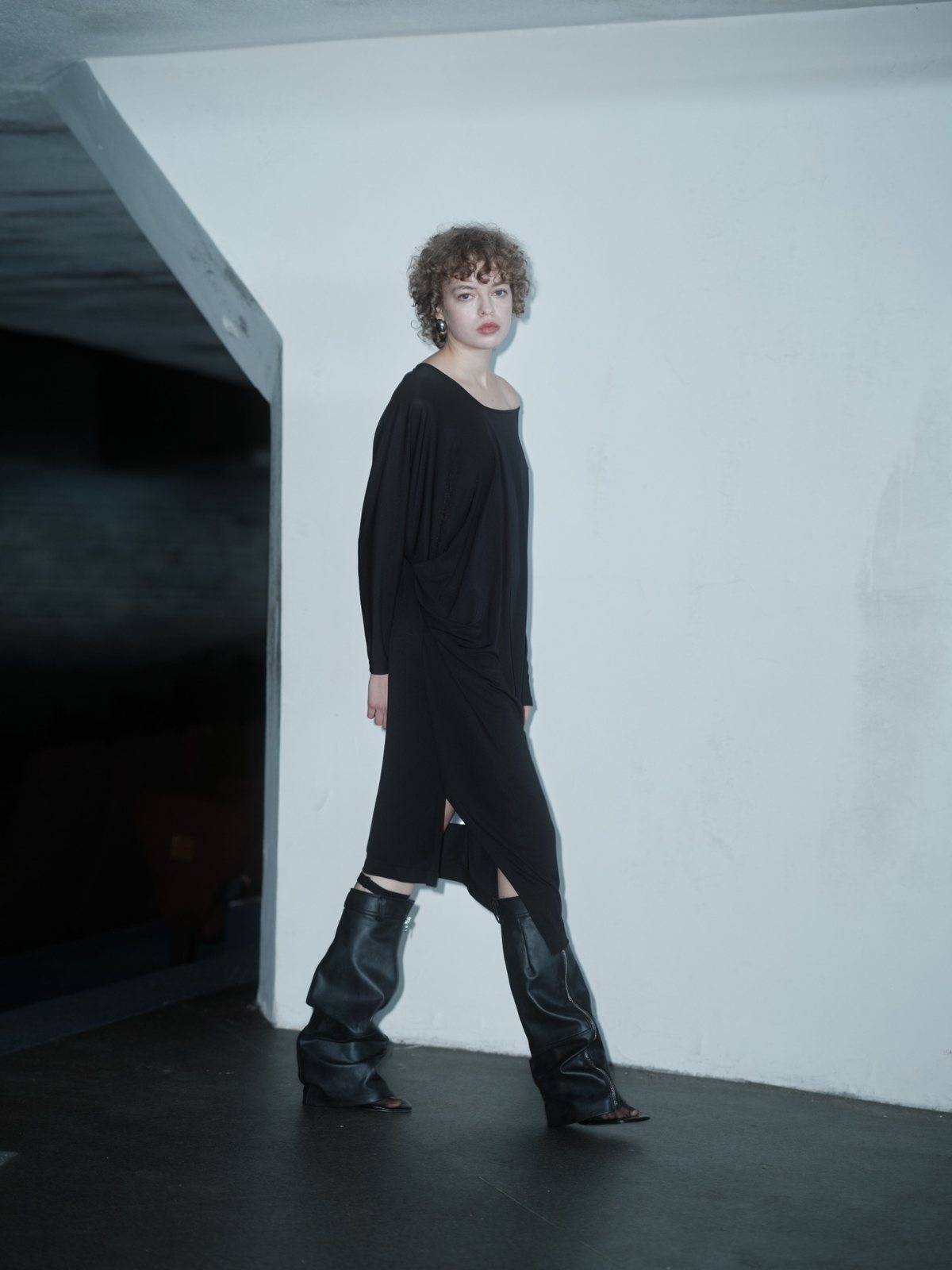 DISRUPTIVE BABE dress in Black Fluid by Xenia Joost, moving view