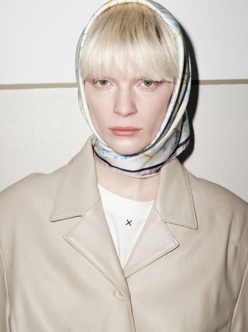 FLY HIGH silk scarf by Xenia Joost worn as a headscarf
