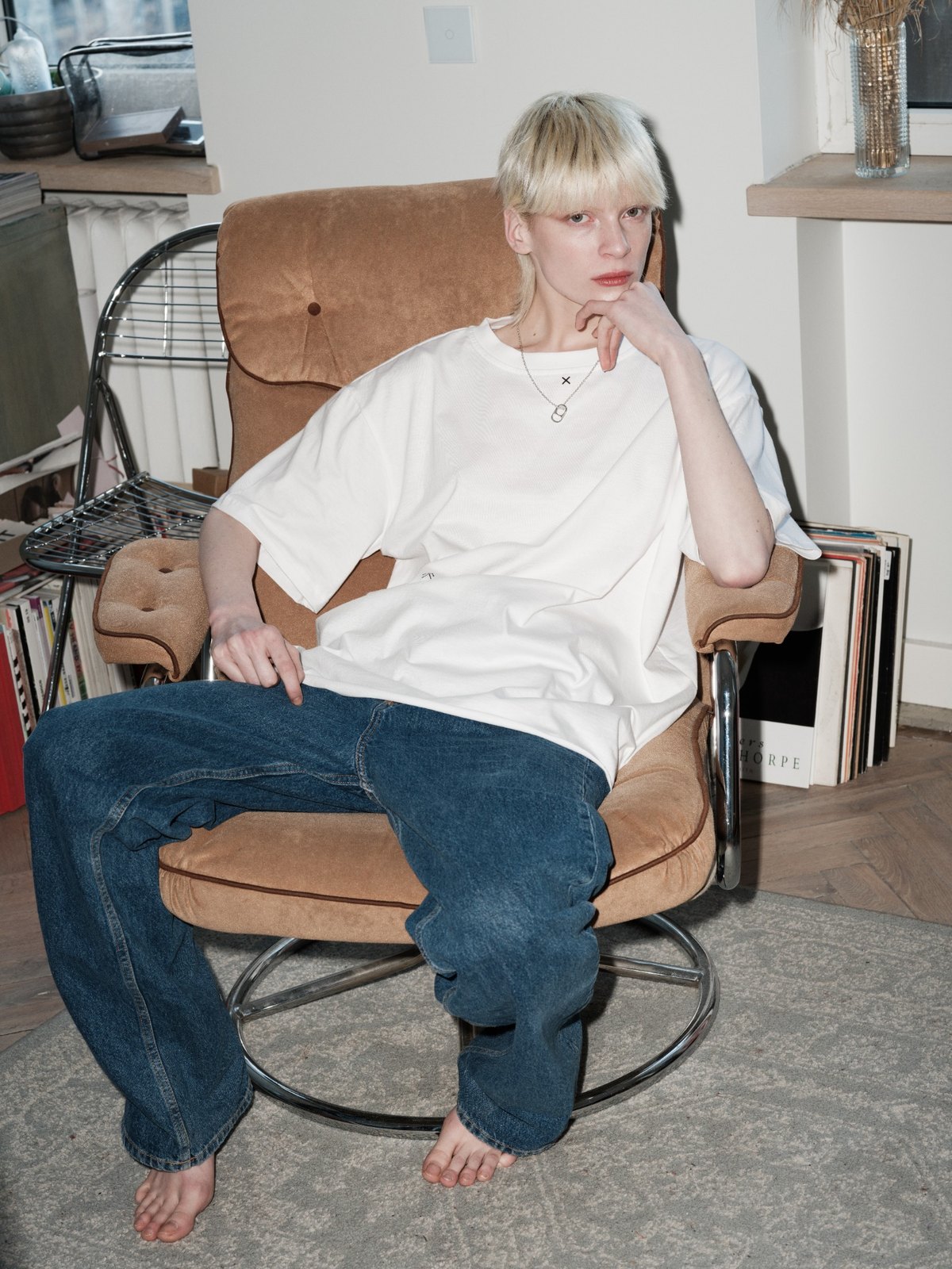 OPEN ME necklace by Xenia Joost worn in seated editorial