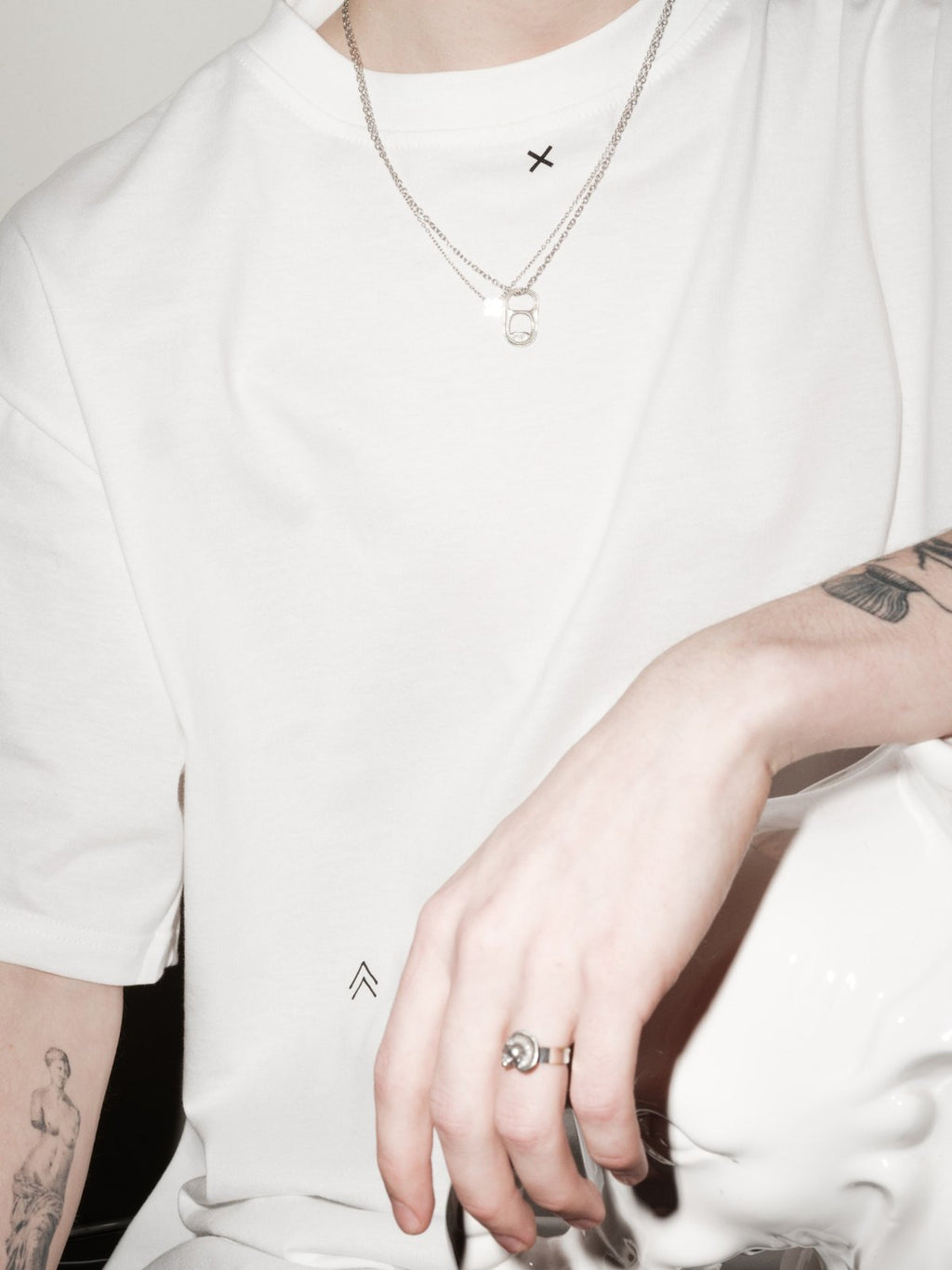 OPEN ME necklace by Xenia Joost worn from the front