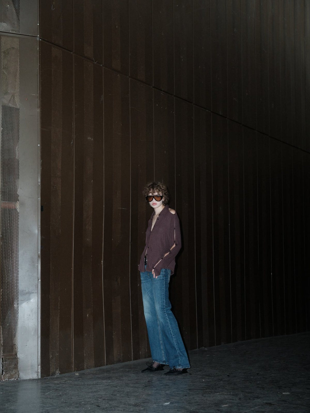 SLEEK VENTURA top in brown by Xenia Joost, side styled view, editorial