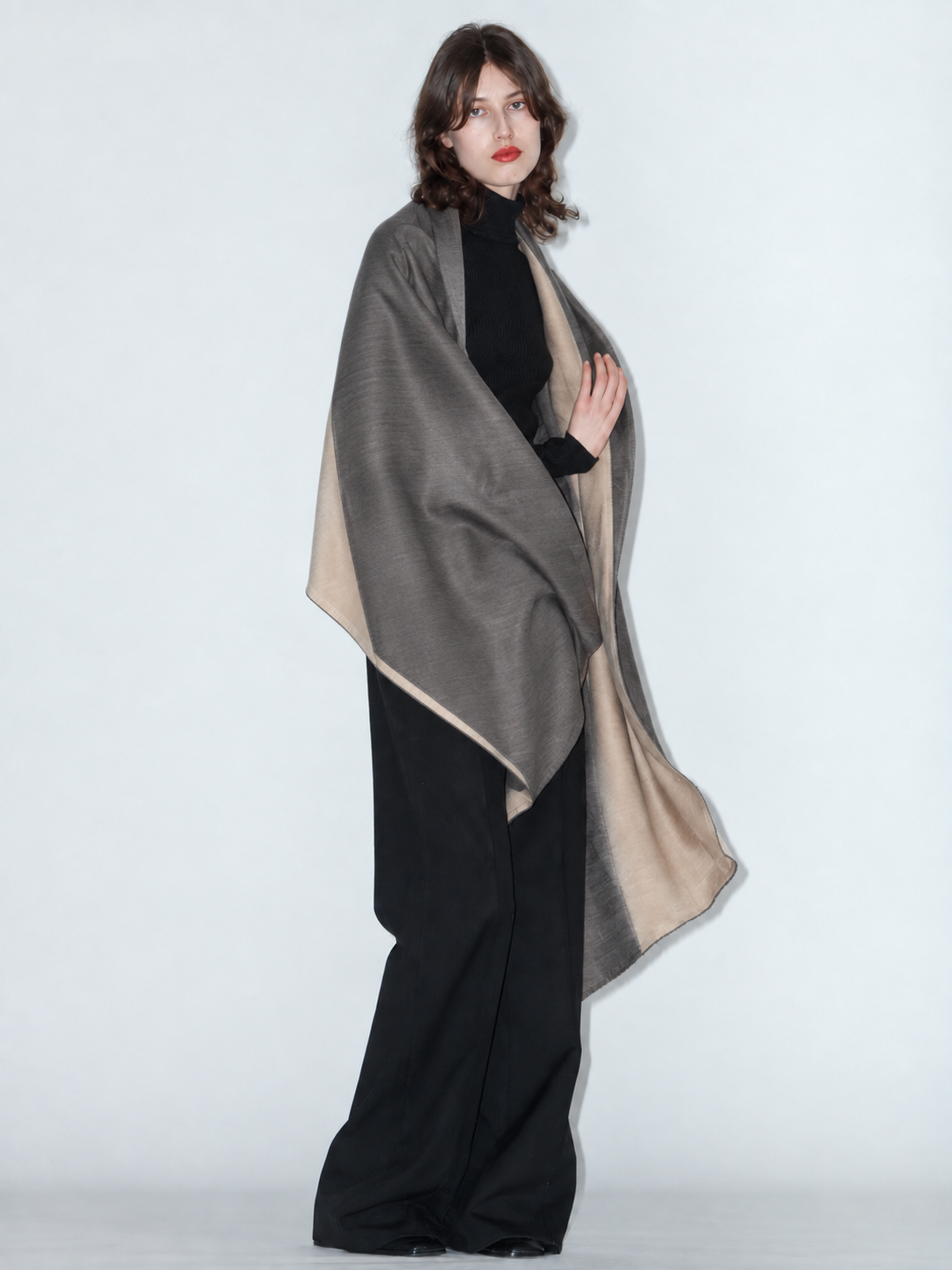 TWO SIDED grey and beige wool and silk scarf by Xenia Joost, worn over a black outfit