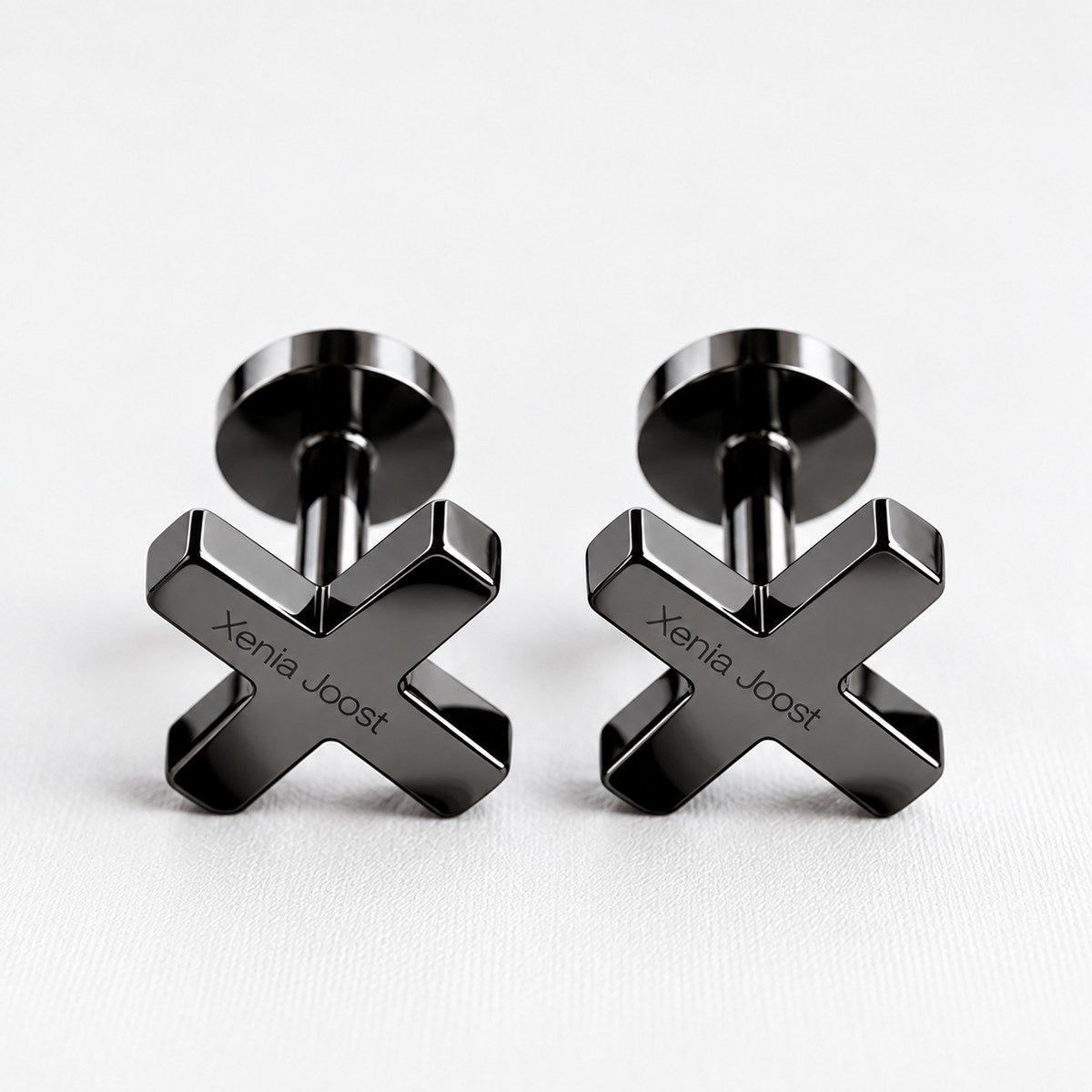 X cufflinks in high-gloss graphite finish by Xenia Joost, front view