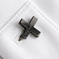 X cufflink in high-gloss graphite finish by Xenia Joost worn on a white shirt cuff